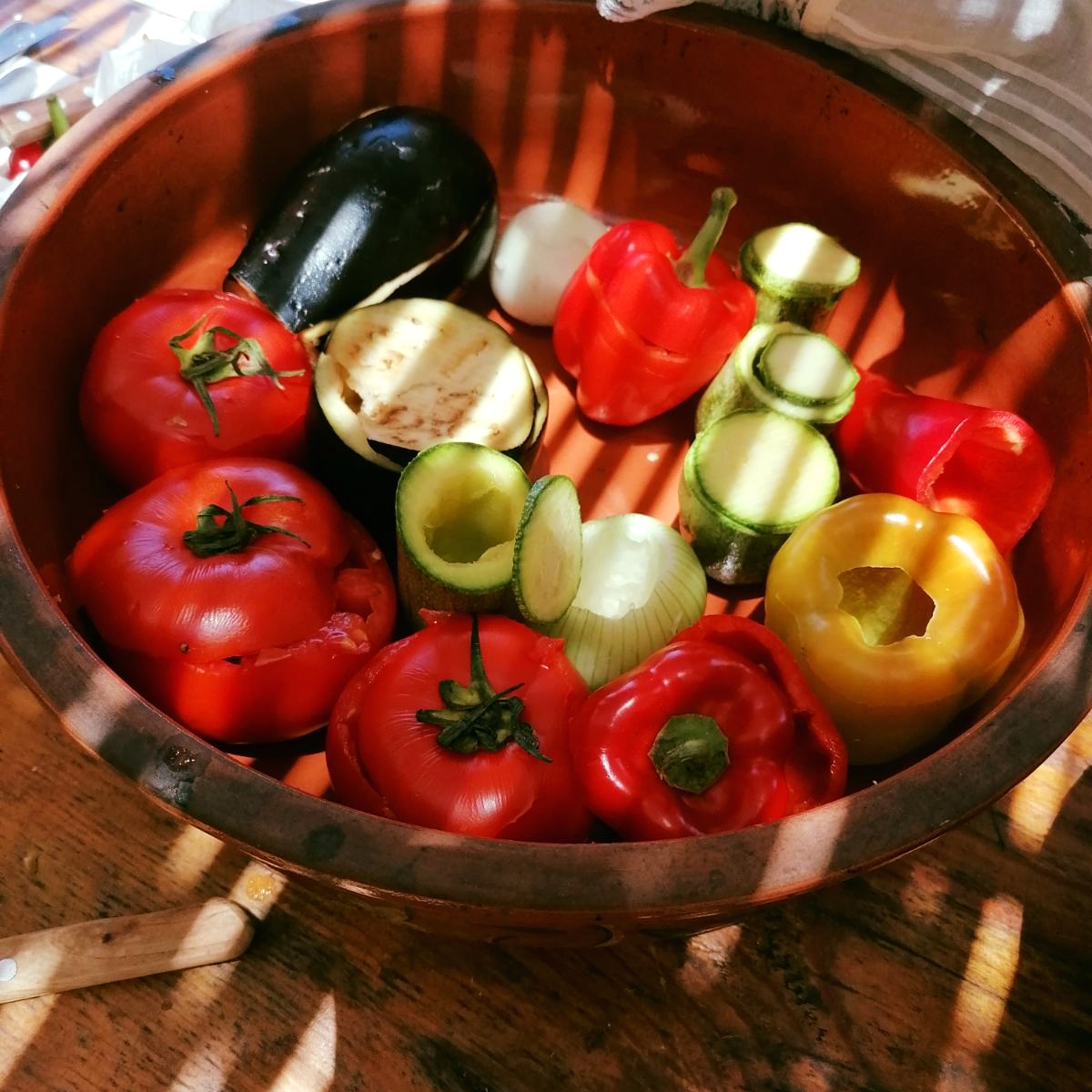 Colourful vegetables in a ceramic pot 