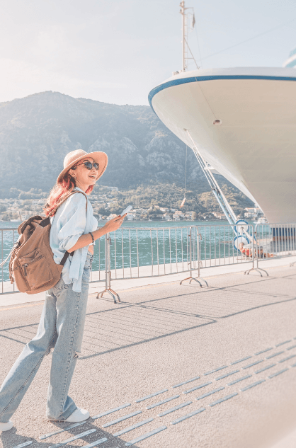 A girl is looking for fun activities on the Cretan coast.