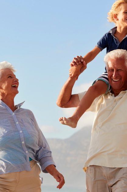 Grandparents on Beach with Grandchild - family bonding and skip gen crete - CV (2)