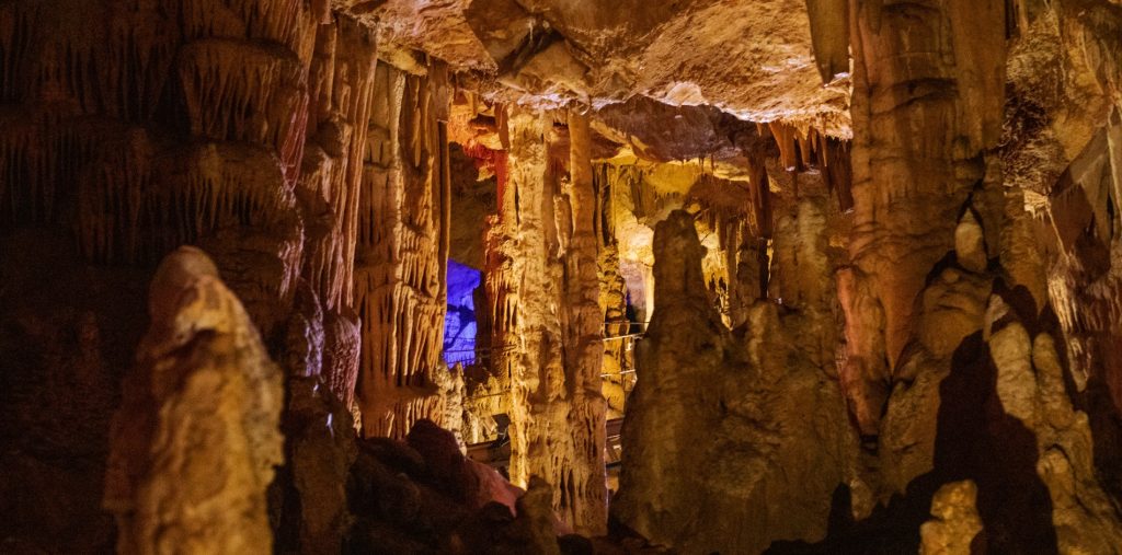 multicolored abstract stalagmites sfendoni cave - CV Featured
